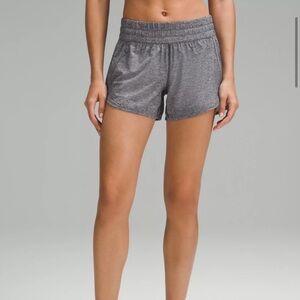 Great condition lululemon tracker short 4 inch size 6. Heater Lux multi black.